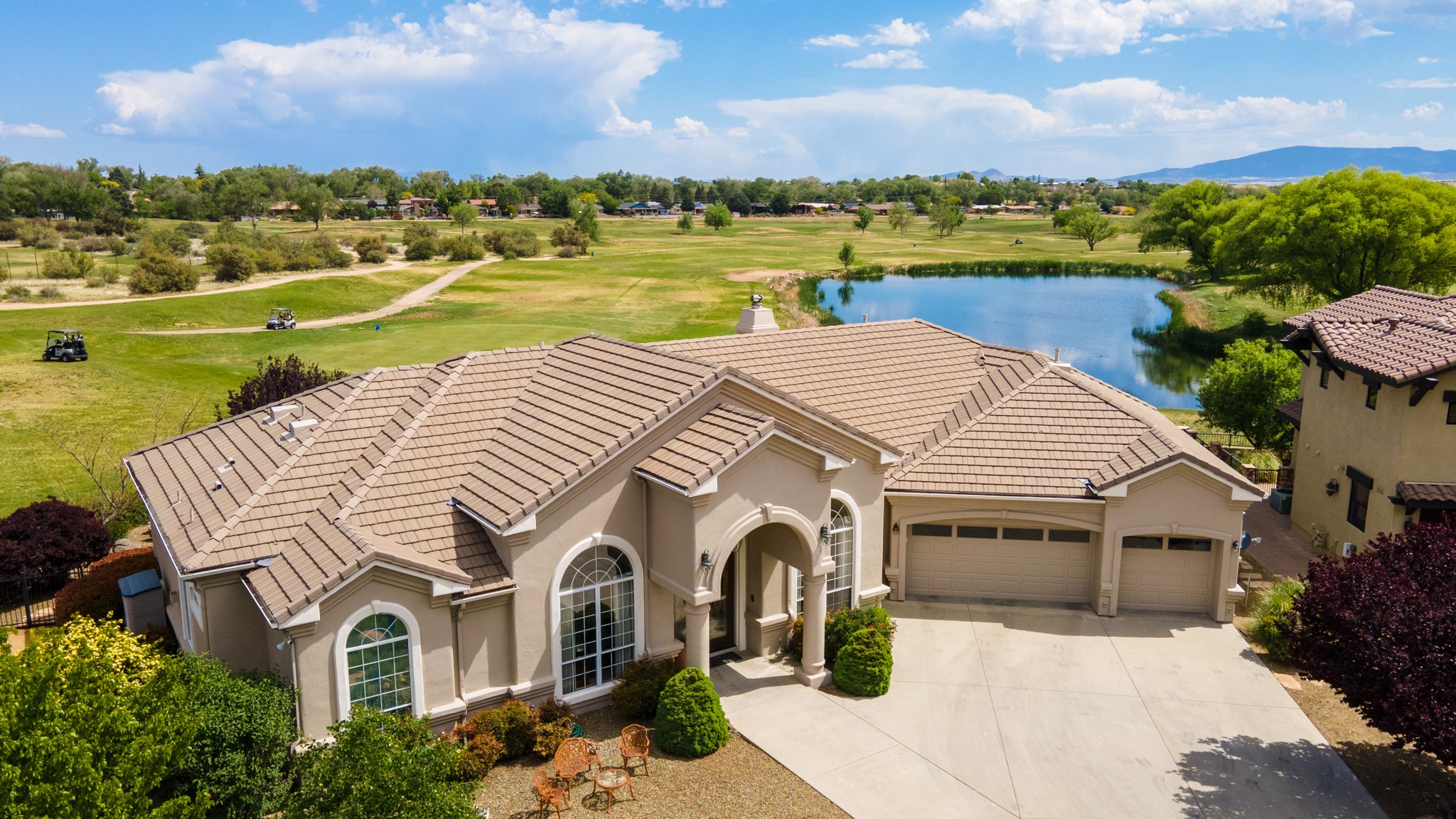 aerial photo of a real estate property on a golf course