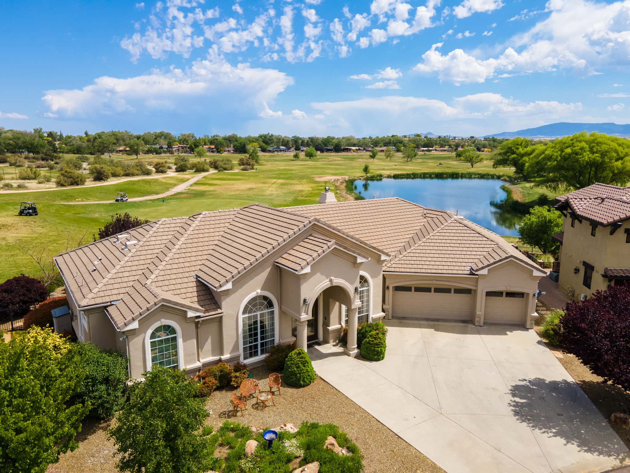 aerial photo of a real estate property on a golf course